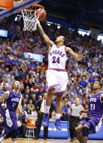 Kansas guard Travis Releford lays in a bucket on a break against Texas Christian during the first half on Saturday, Feb. 23, 2013 at Allen Fieldhouse.