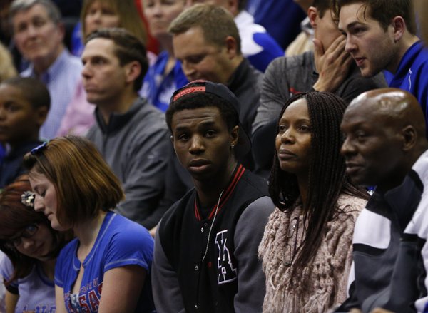 Kansas recruit Andrew Wiggins watches from behind the bench during the second half, Monday, March 4, 2013 at Allen Fieldhouse.