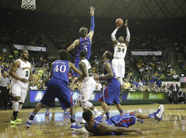 Baylors Cory Jefferson (34) fires in a shot over Jeff Withey (5) in KU's 81-58 loss to the Baylor Bears Saturday in Waco.