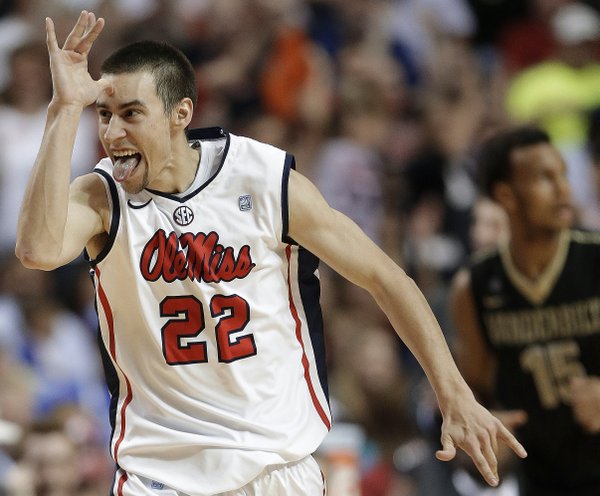 Mississippi guard Marshall Henderson (22) gestures after he made a 3-point shot against Vanderbilt during the second half of an NCAA college basketball game in the semifinals of the Southeastern Conference tournament, Saturday, March 16, 2013, in Nashville, Tenn.