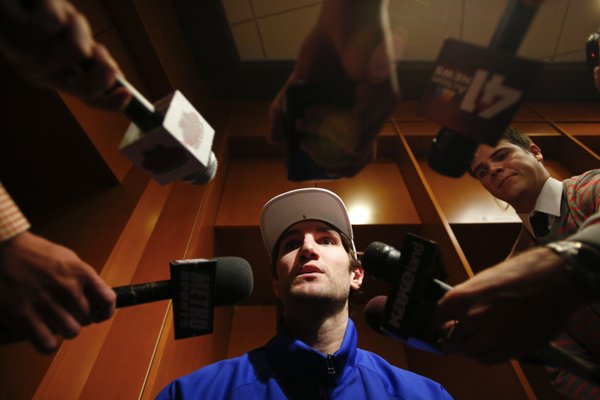 Kansas center Jeff Withey takes questions in the locker room on Thursday, March 22, 2013 at the Sprint Center in Kansas City, Mo.