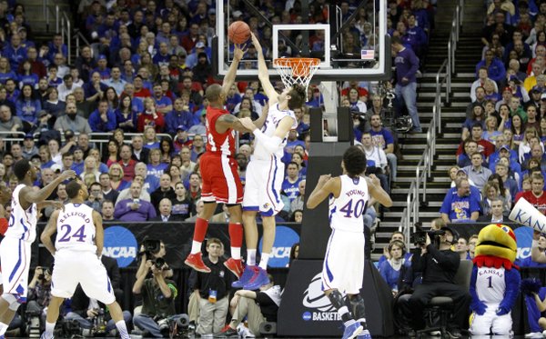 Jeff Withey (5) blocks George Fant in the Jayhawks second-round game against Western Kentucky Friday, March 22, 2013 at the Sprint Center in Kansas City, Mo.