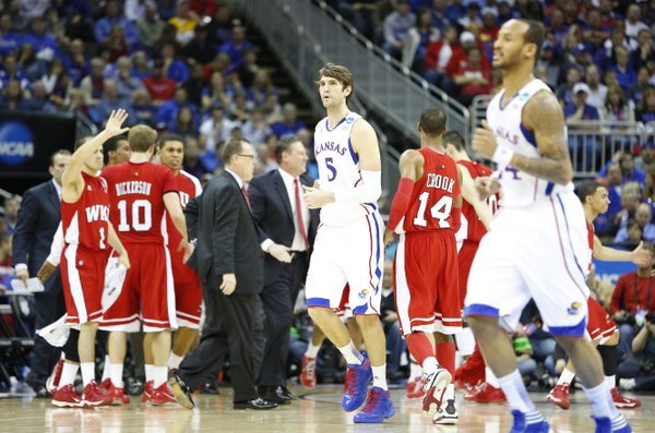 Kansas center Jeff Withey heads back to the Kansas bench after a Western Kentucky bucket and a timeout by the Jayhawks during the first half on Friday, March 22, 2013 at the Sprint Center in Kansas City, Mo.
