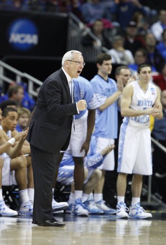 North Carolina head coach Roy Williams pumps his fist as the Tarheels close out the game against Villanova during the second half on Friday, March 22, 2013 at the Sprint Center in Kansas City, Mo.