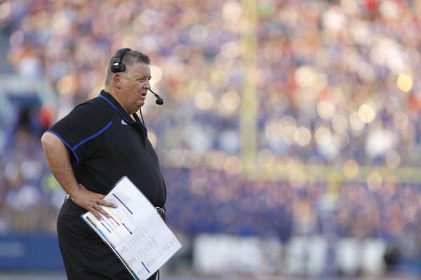 Kansas head coach Charlie Weis watches as a touchdown by Josh Ford is called back during the first quarter against South Dakota on Saturday, Sept. 7, 2013 at Memorial Stadium.
