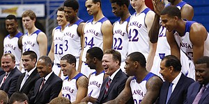 Kansas head coach Bill Self laughs with his team and assistant coaches as they gather together for the official team photo during Media Day on Wednesday, Sept. 25, 2013 at Allen Fieldhouse. Nick Krug/Journal-World Photo