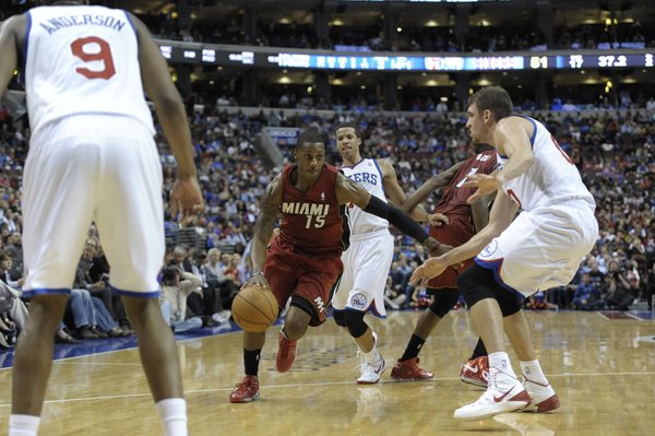 Miami Heat's Mario Chalmers (15) is seen during the first half of an NBA basketball game against the Philadelphia 76ers on Wednesday, Oct. 30, 2013, in Philadelphia. (AP Photo/Michael Perez) 