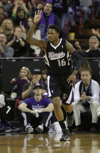Sacramento Kings guard Ben McLemore flashes three fingers after scoring a three-point shot during the first quarter of an NBA basketball game against the Los Angeles Clippers in Sacramento, Calif., Friday, Nov. 29, 2013. (AP Photo/Rich Pedroncelli)
