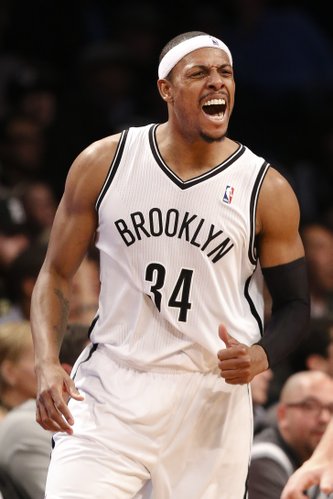 Brooklyn Nets small forward Paul Pierce (34) reacts to a score in the second half of an NBA basketball game against the Los Angeles Lakers at the Barclays Center, Wednesday, Nov. 27, 2013, in New York. The Lakers defeated the Nets 99-94. (AP Photo/John Minchillo) 