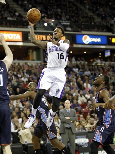 Sacramento Kings guard Ben McLemore (16) shotts against the Charlotte Bobcats during the second half of an NBA basketball game in Sacramento, Calif., on Saturday, Jan. 4, 2014. The Bobcats beat the Kings 113-103.(AP Photo/Steve Yeater)