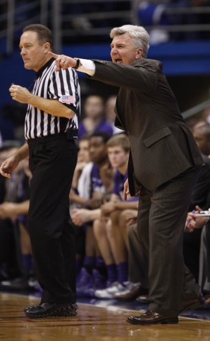 Kansas State head coach Bruce Weber directs his defense during the second half on Saturday, Jan. 11, 2014 at Allen Fieldhouse.