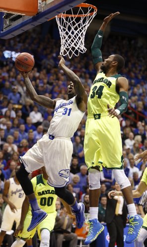 Kansas forward Jamari Traylor maneuvers for a bucket against Baylor forward Cory Jefferson during the first half on Monday, Jan. 20, 2014 at Allen Fieldhouse.