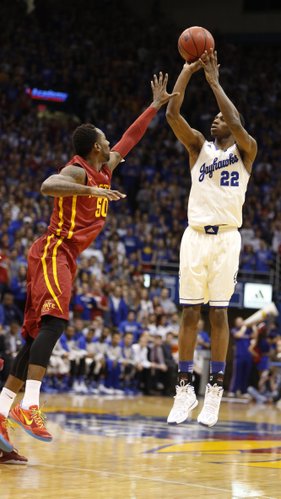 Kansas guard Andrew Wiggins puts a three over Iowa State guard DeAndre Kane during the first half on Wednesday, Jan. 29, 2014 at Allen Fieldhouse.