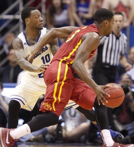 Kansas guard Naadir Tharpe defends as Iowa State forward Melvin Ejim drives during the first half on Wednesday, Jan. 29, 2014 at Allen Fieldhouse.