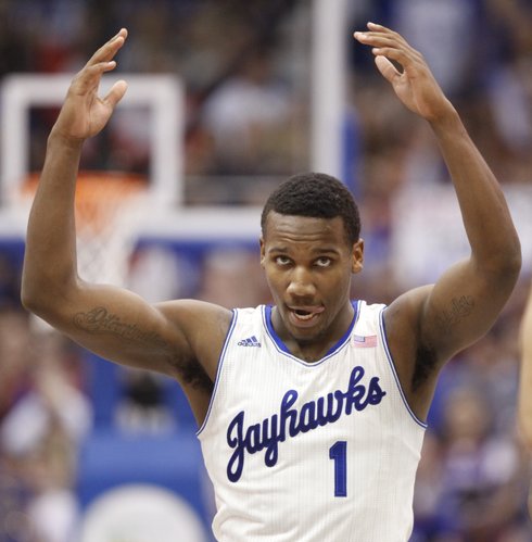 Kansas guard Wayne Selden raises up the fieldhouse during a Jayhawk run against Iowa State during the second half on Wednesday, Jan. 29, 2014 at Allen Fieldhouse.