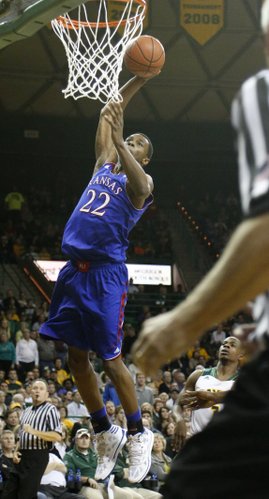 Kansas guard Andrew Wiggins leaps to put down a runaway dunk in the second half of the Jayhawks' win over Baylor Tuesday, Feb. 4, 2014 at Ferrell Center in Waco, Texas.