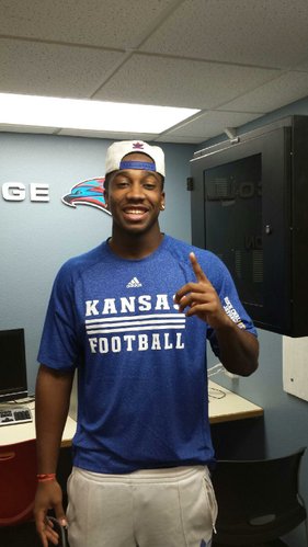 Damani Mosby was all smiles after signing his letter of intent with the Jayhawks. 