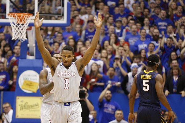 Kansas guard Wayne Selden raises up the fieldhouse during a timeout after hitting a three against West Virginia during the second half on Saturday, Feb. 8, 2014 at Allen Fieldhouse.