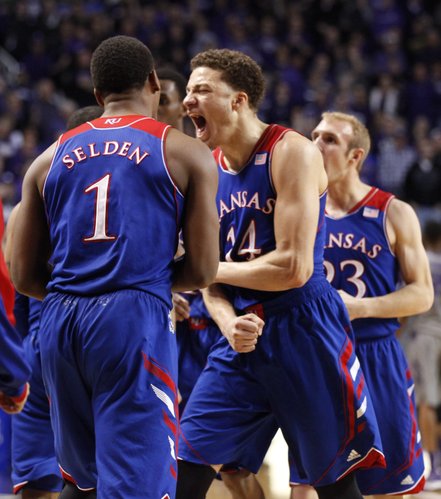 Kansas guard Brannen Greene (14) celebrates after the Jayhawks forced overtime against Kansas State at the end of the second half on Monday, Feb. 10, 2014 at Bramlage Coliseum.