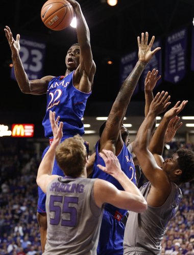 Kansas guard Andrew Wiggins grabs an offensive rebound over the Kansas State defense during the second half on Monday, Feb. 10, 2014 at Bramlage Coliseum.