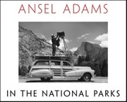 Ansel Adams shown on top of his Ford Woody station wagon around 1941-42 in Yosemite National Park. Adams constructed a mounted platform, where he would perch his large format camera on a tripod and shoot.