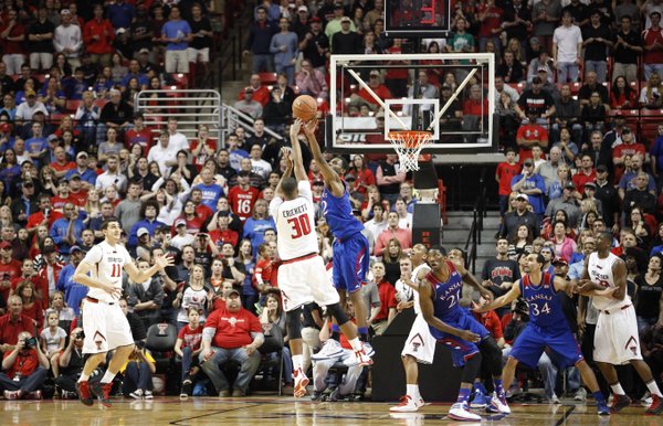 Kansas guard Andrew Wiggins blocks a shot from Texas Tech forward Jaye Crockett late in the game on Tuesday, Feb. 18, 2014 at United Spirit Arena in Lubbock, Texas.