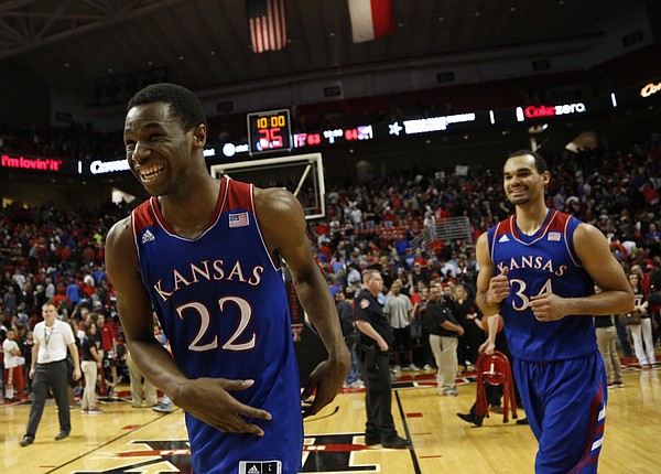 Kansas guard Andrew Wiggins flashes a wide smile after getting a bucket with seconds left to life the Jayhawks over Texas Tech 64-63 on Tuesday, Feb. 18, 2014 at United Spirit Arena in Lubbock, Texas. At right is Kansas forward Perry Ellis.