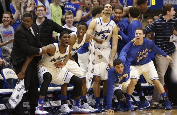 The Kansas bench reacts with disbelief after a dunk by forward Tarik Black sent the fieldhouse into a frenzy during the second half on Saturday, Feb. 22, 2014 at Allen Fieldhouse.