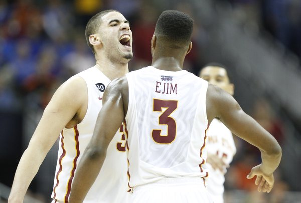 Iowa State forwards Georges Niang and Melvin Ejim celebrate the Cyclones' win over Kansas State on Thursday, March 13, 2014 at Sprint Center in Kansas City, Missouri. They will face Kansas in the semifinal round of the Big 12 Tournament on Friday.