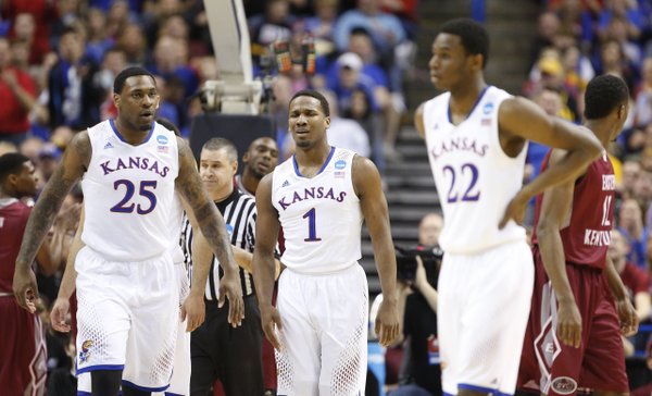 Kansas guard Wayne Selden (1) shows his frustration after being called for a foul during the first half on Friday, March 21, 2014 at Scottrade Center in St. Louis. Also pictured are Tarik Black (25) and Andrew Wiggins (22).