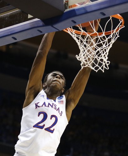 Kansas guard Andrew Wiggins comes in for a dunk against Eastern Kentucky during the second half on Friday, March 21, 2014 at Scottrade Center in St. Louis.