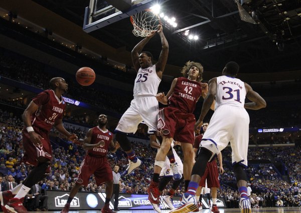 Kansas forward Tarik Black pounds home a dunk against Eastern Kentucky during the second half on Friday, March 21, 2014 at Scottrade Center in St. Louis.