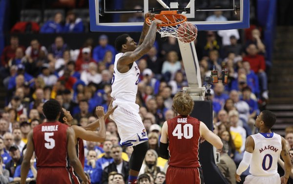Kansas forward Tarik Black delivers on a dunk over the Stanford defense during the second half on Sunday, March 23, 2014 at Scottrade Center in St. Louis.