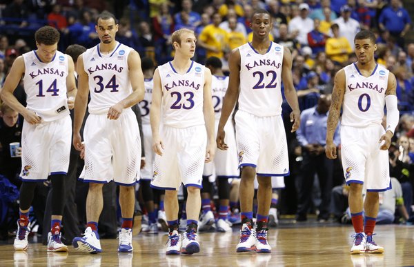 Kansas players Brannen Greene, left, Perry Ellis, Conner Frankamp, Andrew Wiggins and Frank Mason come out for their final possession after a timeout on Sunday, March 23, 2014 at Scottrade Center in St. Louis.