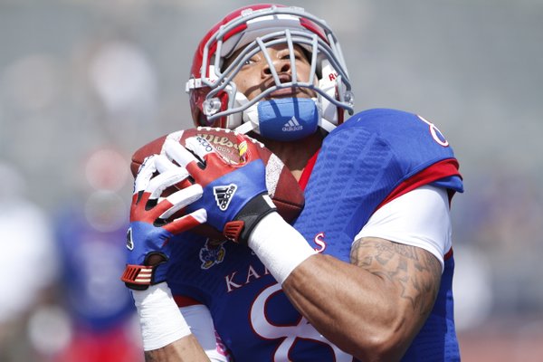 Kansas receiver Nick Harwell pulls in a pass in the end zone during warmups prior to start of the Kansas Spring Game on Saturday, April 12, 2014 at Memorial Stadium. Nick Krug/Journal-World Photo