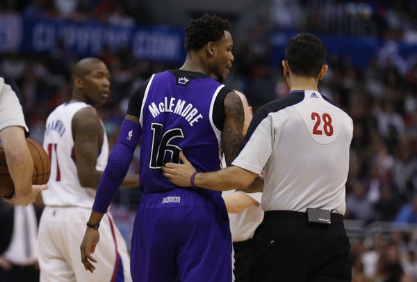 Sacramento Kings guard Ben McLemore is ejected after being called for a technical foul on Los Angeles Clippers guard J.J. Redick, as Clippers' Jamal Crawford, rear left, looks on during the second half of an NBA basketball game in Los Angeles, Saturday, April 12, 2014. The Clippers won 117-101. (AP Photo/Danny Moloshok)