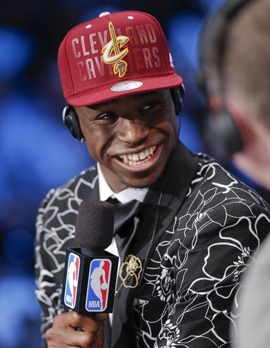 Kansas' Andrew Wiggins answers questions during an interview after being selected as the number one pick overall by the Cleveland Cavaliers during the 2014 NBA draft, Thursday, June 26, 2014, in New York. (AP Photo/Kathy Willens)