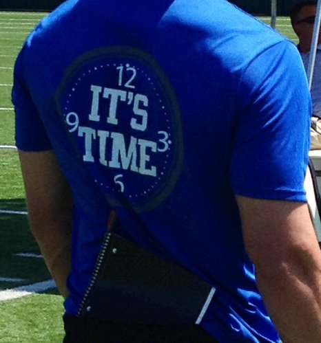 A Kansas staff member wears one of the Jayhawks' "It's Time" T-Shirts made for the 2014 season. 