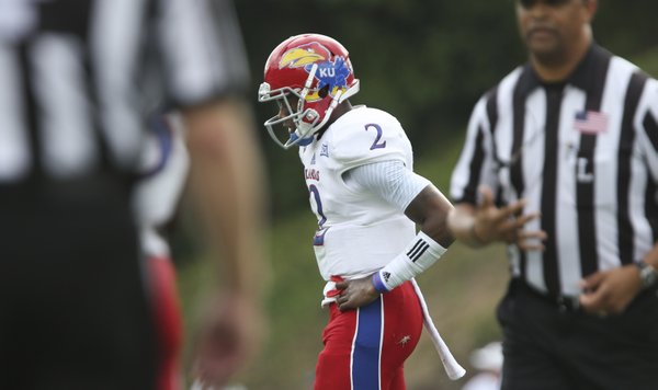 Kansas quarterback Montell Cozart reacts after a turnover on downs by the Jayhawks against Duke during the first quarter on Saturday, Sept. 13, 2013 at Wallace Wade Stadium in Durham, North Carolina.