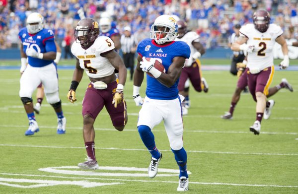 Kansas wasted no time getting on the board as senior Tony Pierson takes the ball 74 yards for a touchdown on the opening play from scrimmage during Kansas' game against Central Michigan on Saturday afternoon at Memorial Stadium. 