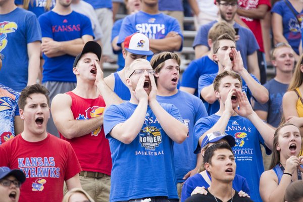 Fans shout "rock chalk" across the stadium after a key Kansas first down during the second half of Kansas' game against Central Michigan Saturday afternoon at Memorial Stadium.