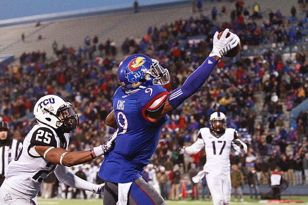 Kansas receiver Nigel King one-hands an end zone pass that was ruled out of bounds during the fourth quarter on Saturday, Nov. 15, 2014 at Memorial Stadium.
