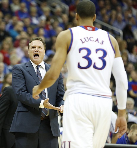 Kansas head coach Bill Self questions a play by forward Landen Lucas during the second half on Saturday, Dec. 13, 2014 at Sprint Center