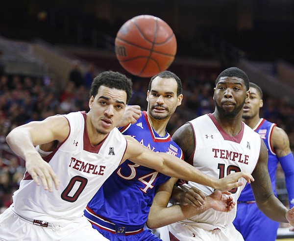 Kansas forward Perry Ellis gets boxed out on a rebound during the Jayhawk's game against the Temple Owls Monday at the Wells Fargo Center in Philadelphia, PA.