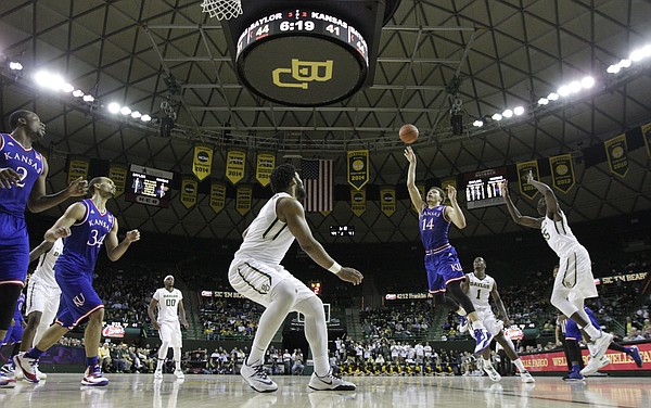 Kansas guard Brannen Greene (14) puts up a floater against Baylor with time winding down during the second half on Wednesday, Jan. 7, 2014 at Ferrell Center in Waco, Texas.