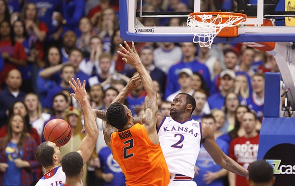 Kansas forward Cliff Alexander (2) swats a shot from Oklahoma State forward Le'Bryan Nash (2) during the first half, Tuesday, Jan. 13, 2015 at Allen Fieldhouse.