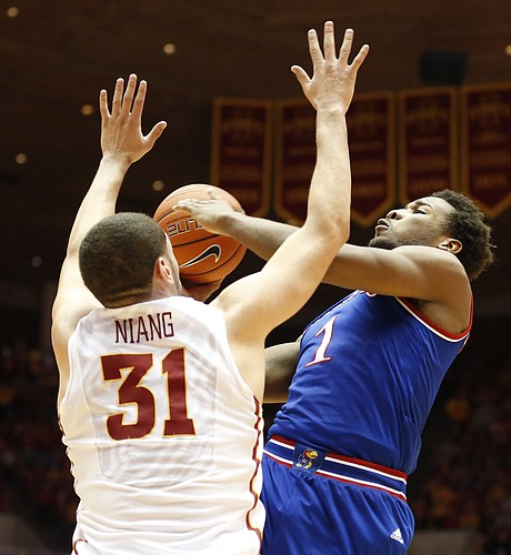 Kansas guard Wayne Selden Jr. (1) hangs for a shot against Iowa State forward Georges Niang (31) during the first half on Saturday, Jan. 17, 2015 at Hilton Coliseum.