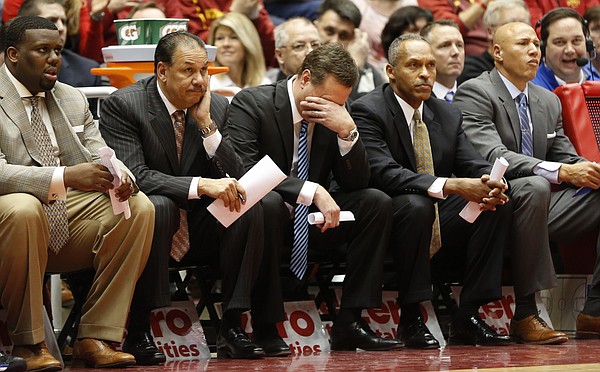 Kansas head coach Bill Self, center, and his coaching staff show frustration with a Jayhawk turnover during the second half on Saturday, Jan. 17, 2015 at Hilton Coliseum.