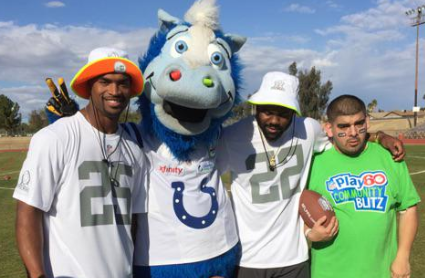 Former KU safety and Kansas City, Kansas native Darrell Stuckey — joined by New Orleans Saints RB Mark Ingram — takes time out for a photo at a Pro Bowl event earlier this week. (photo courtesy Indianapolis Colts mascot @blue) 