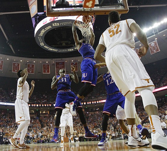 Kansas forward Cliff Alexander (2) gets a slam on a put-back dunk against Texas during the first half, Saturday, Jan. 24, 2015 at Frank Erwin Center in Austin, Texas.